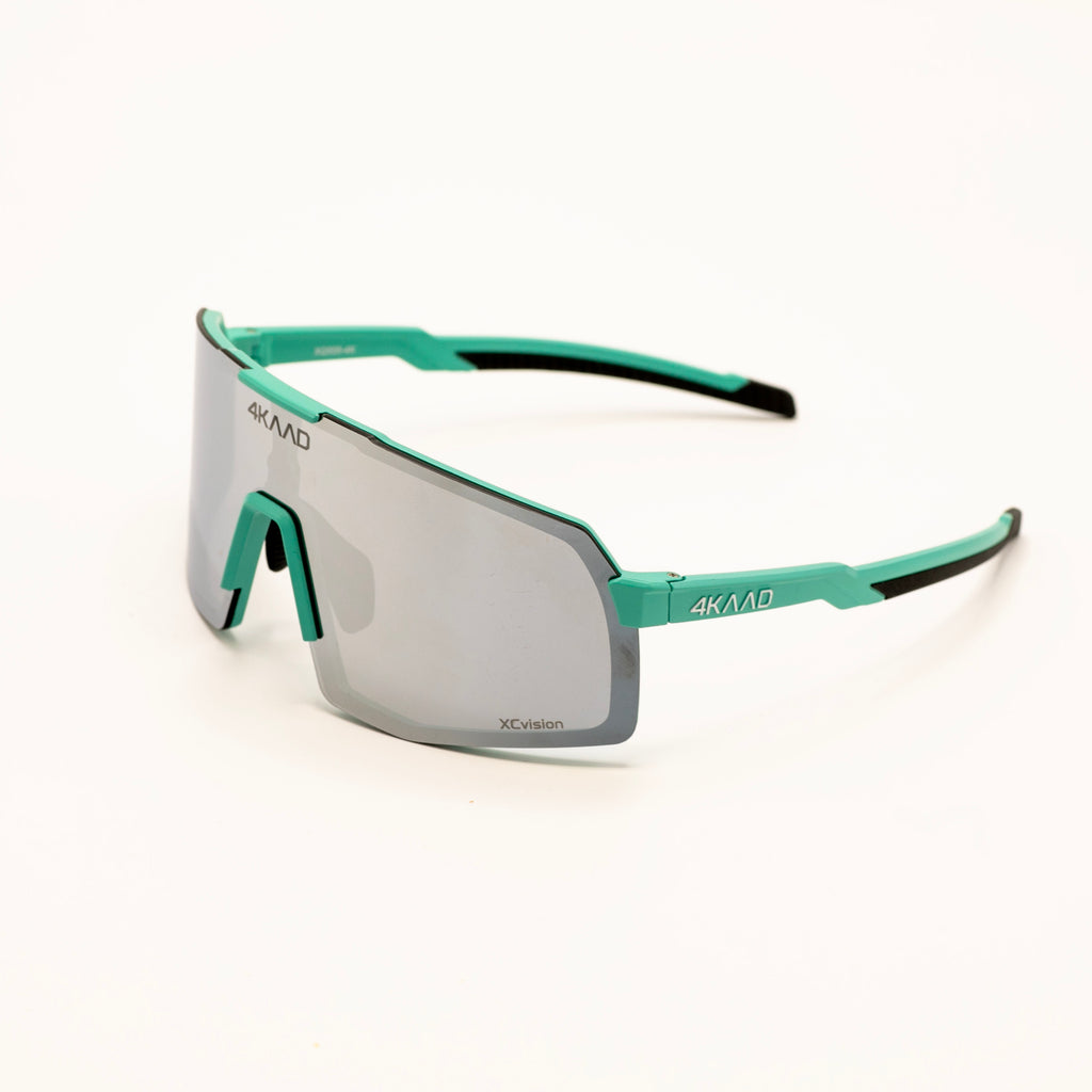 4KMAAD sport sunglasses with a matte teal frame and a silver mirrored shield lens, shown on a clean white background.
