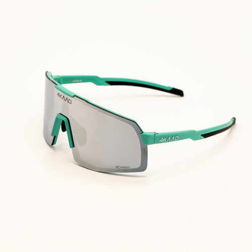 4KMAAD sport sunglasses with a matte teal frame and a silver mirrored shield lens, shown on a clean white background.