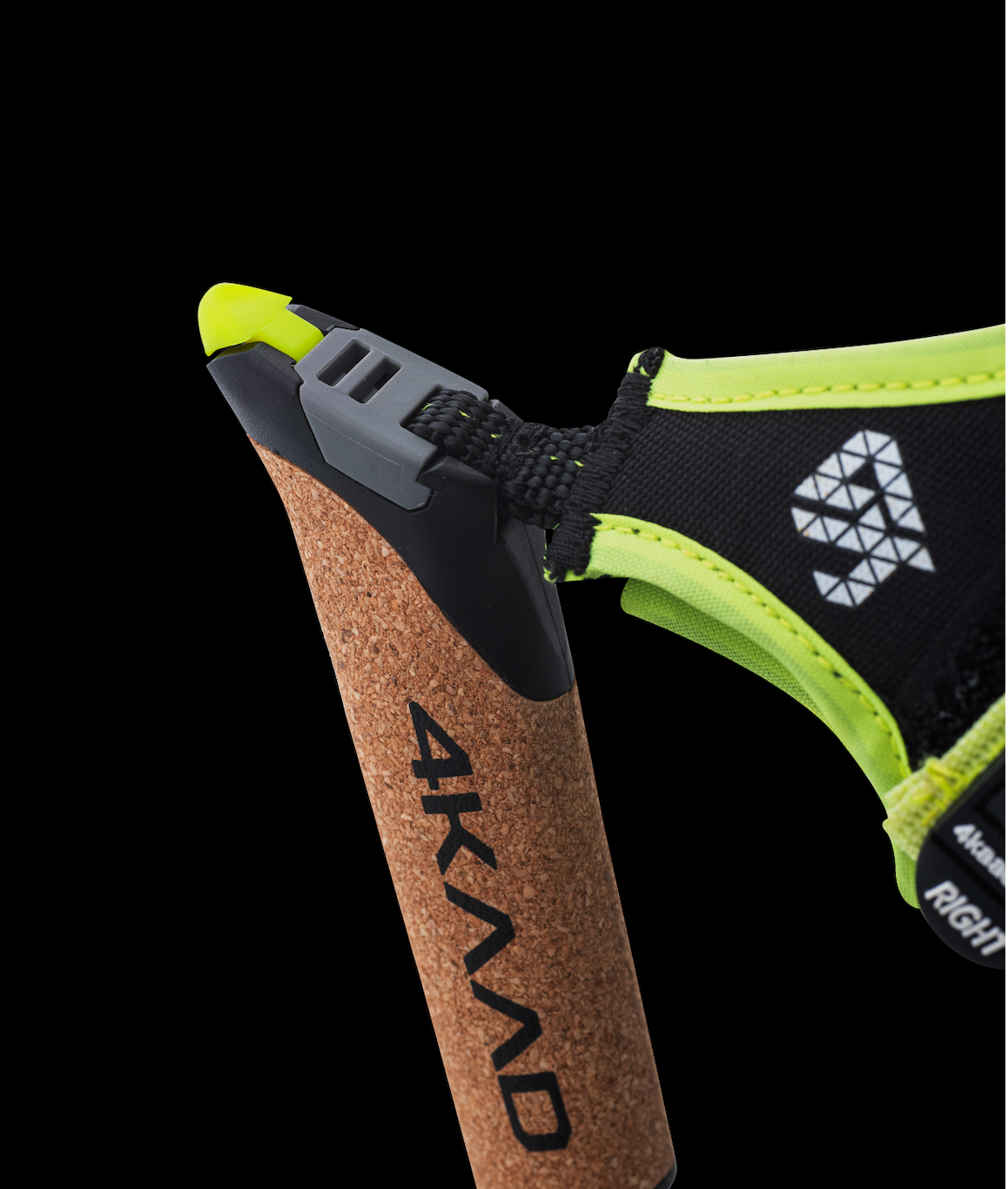 Close-up of a bicycle handlebar grip with the brand name 'DAYAO' printed vertically in black, attached to a black and neon yellow saddle or handlebar component against a solid black background.