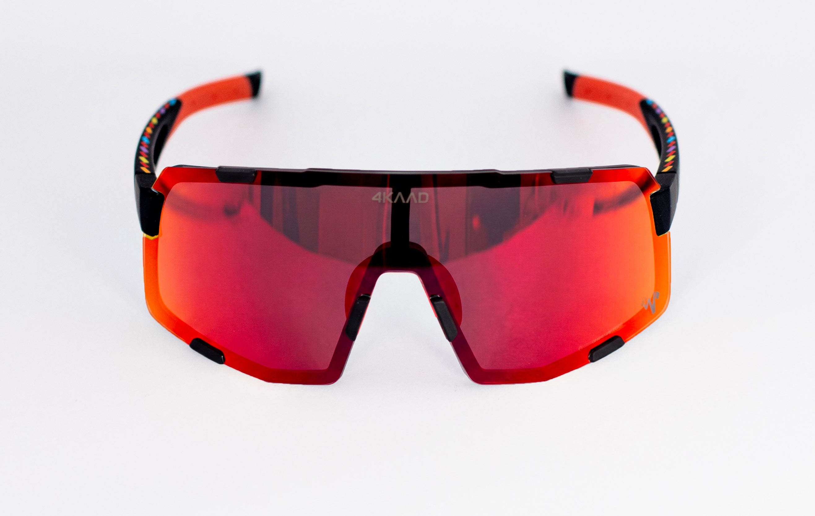 A pair of wraparound sports sunglasses with a black and orange frame and a red mirrored lens, shown on a clean white background.
